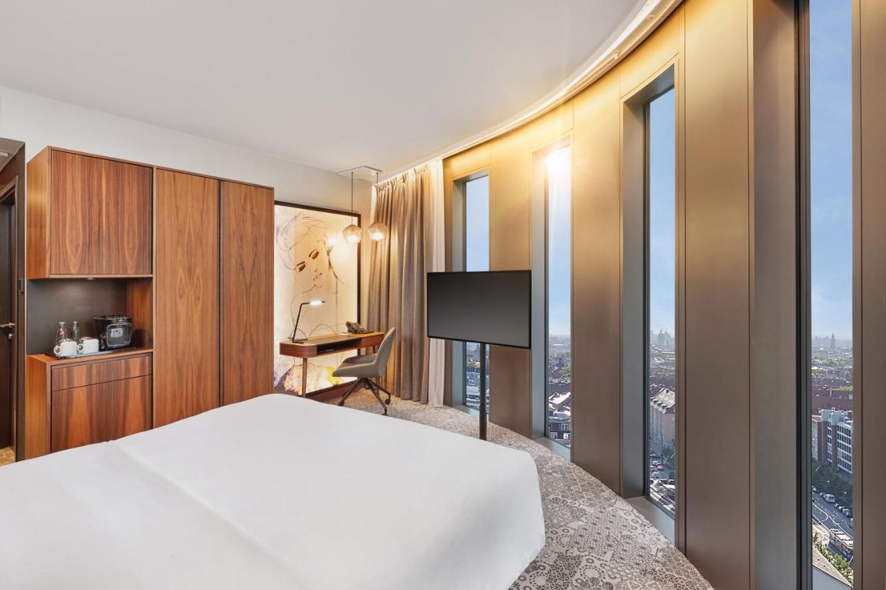 فندق هايبريون ميونيخ المظهر الخارجي الصورة A bedroom at the hotel